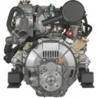 A compact engine assembly with various components and wiring.