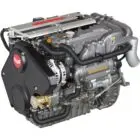 A Yanmar diesel engine with various hoses and components.