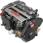 A Yanmar diesel engine with various components and hoses attached.
