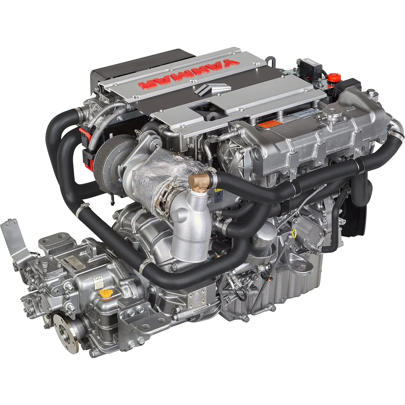 A silver mechanical engine with black hoses and components.