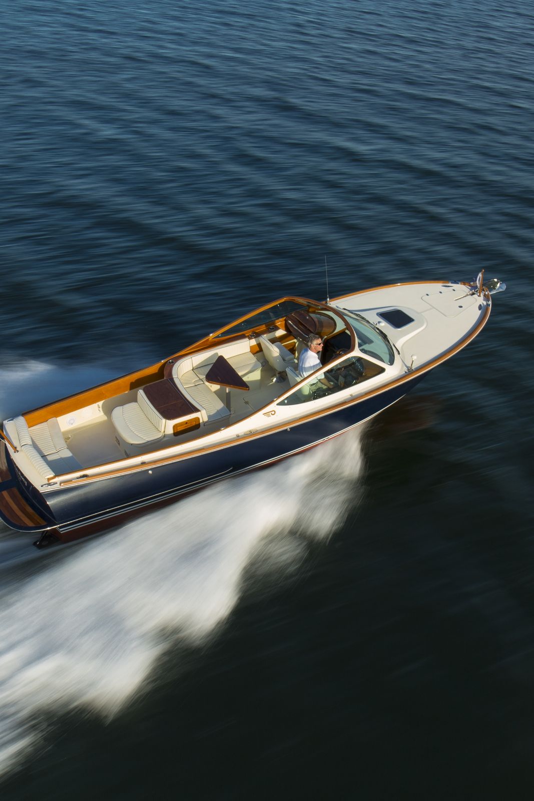 A YANMAR-powered Hinckley runabout under way, seen from above